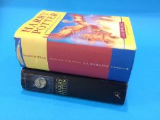 Books: Harry Potter, two first editions, one signed by J. K. Rowling (2)