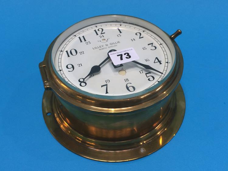 A brass Ships clock case