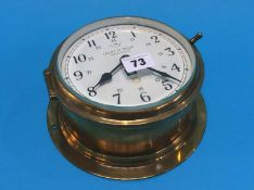 A brass Ships clock case