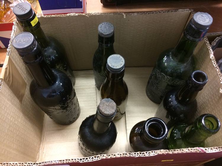 Nine glass advertising bottles to include, 'Darlington Trade Mark Bottling Co Ltd' (x2), 'P.G.