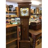 An oak long case clock, with eight day movement