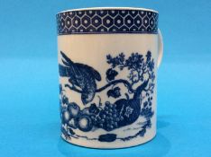 A Worcester, circa 1775-1780, 'Pecking Parrot' tankard decorated, with marks in under glaze blue,