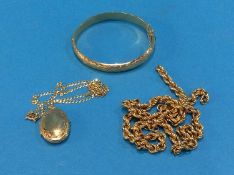 A 9ct gold bangle, a chain stamped 9kt and a 9ct gold chain with pendant, total 29.5 grams