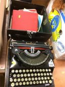 An Imperial typewriter and records