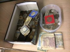 Box of bank notes and coins
