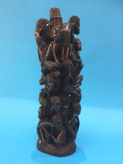 A carved wood African group
