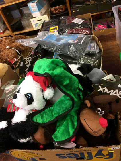 Three boxes of dog toys and coats