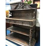 A carved oak barley twist buffet, 135cm wide