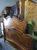 A French walnut carved bed end