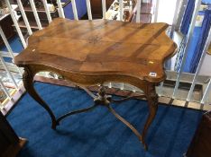 A Continental oak occasional table