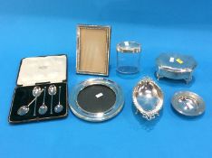 Two silver photo frames, two silver dishes, a lidded box etc.