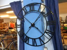 A large steel clock