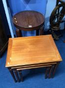 An oak Art Deco side table and a nest of tables