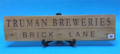 A wooden sign 'Truman Breweries'