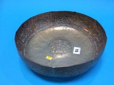A Chinese embossed circular bowl