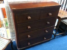 A mahogany straight front chest of five drawers