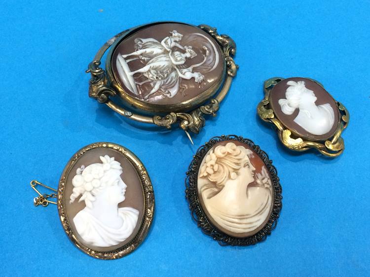 Four various cameo brooches