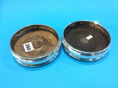 Pair of silver wine coasters
