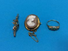 A 9ct gold ring, a brooch and a yellow metal mounted cameo