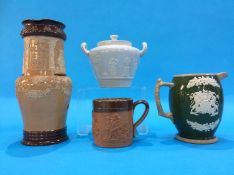 A Doulton Lambeth jug 'Welcome is the best Cheer', a small stoneware tankard etc. (4)