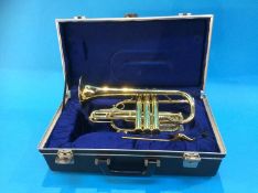 A cased Boosey and Hawkes cornet