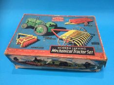 A boxed Mettoy 'Modern Farming Mechanical Tractor' set