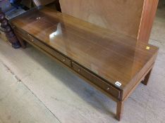 A G Plan coffee table and a teak bookcase
