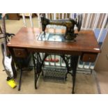 A Singer treddle sewing machine