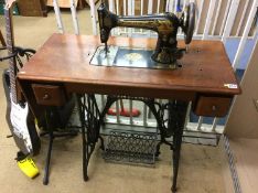 A Singer treddle sewing machine