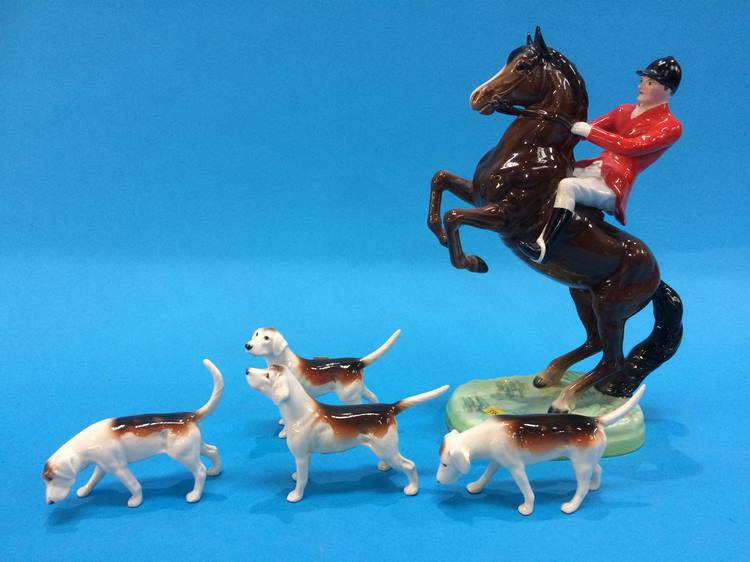 A Beswick huntsman on a rearing horse and four hounds - Image 2 of 2