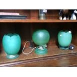 Pair of pressed glass lamps and one other