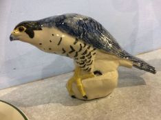 A ceramic bird of prey