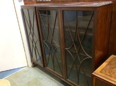 Mahogany three door bookcase