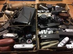 Two trays of cameras