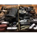 Two trays of cameras