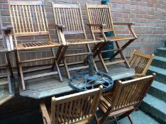 Teak table and six chairs