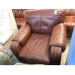 Brown leather armchair