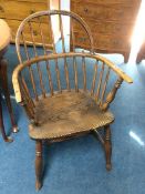 A 19th century stick back Windsor chair