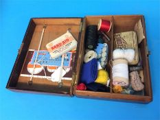 A small wooden sewing box