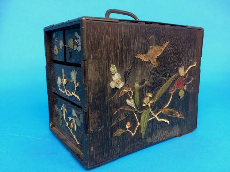 An Oriental travelling cabinet, decorated with Shibayama panels