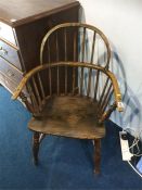 A stick back Windsor chair