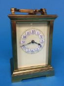 A brass four glass carriage clock, movement and dial unsigned