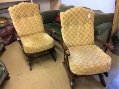 A pair of rocking chairs