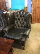 A good quality Chesterfield buttoned high back arm chair