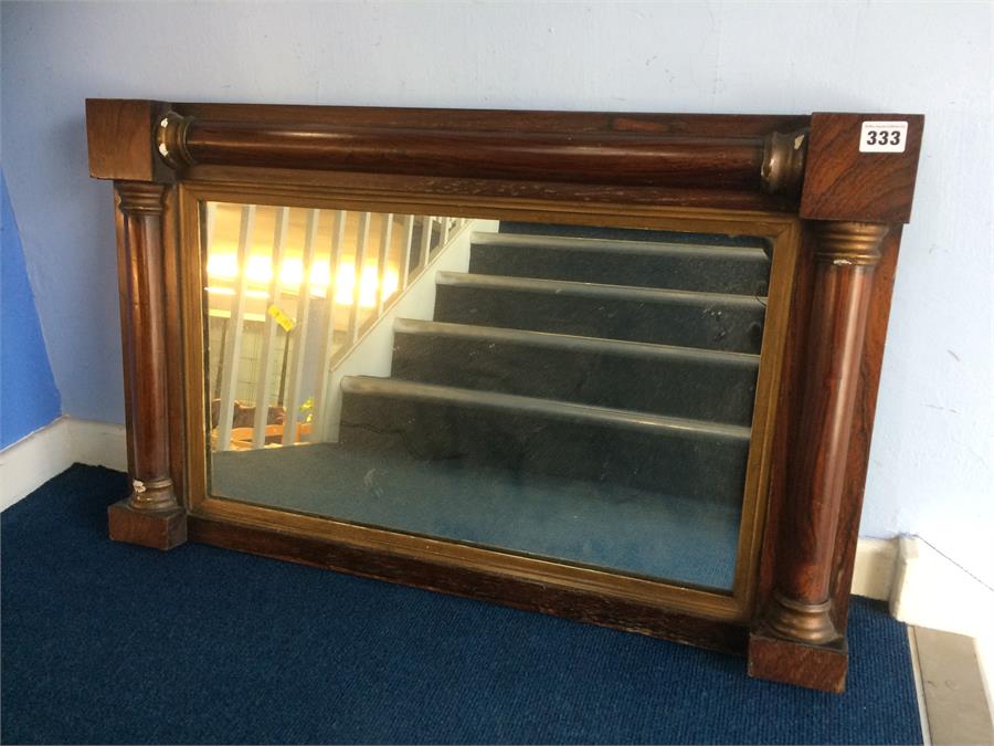 A rosewood rectangular mirror