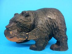 A carved wood bear