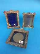 Three silver picture frames