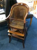 A 19th century Bergere mahogany child's high chair with stand