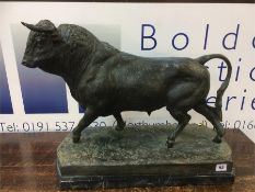 A bronze bull after Mariano Benlliure on a marble plinth