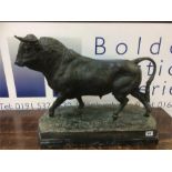 A bronze bull after Mariano Benlliure on a marble plinth